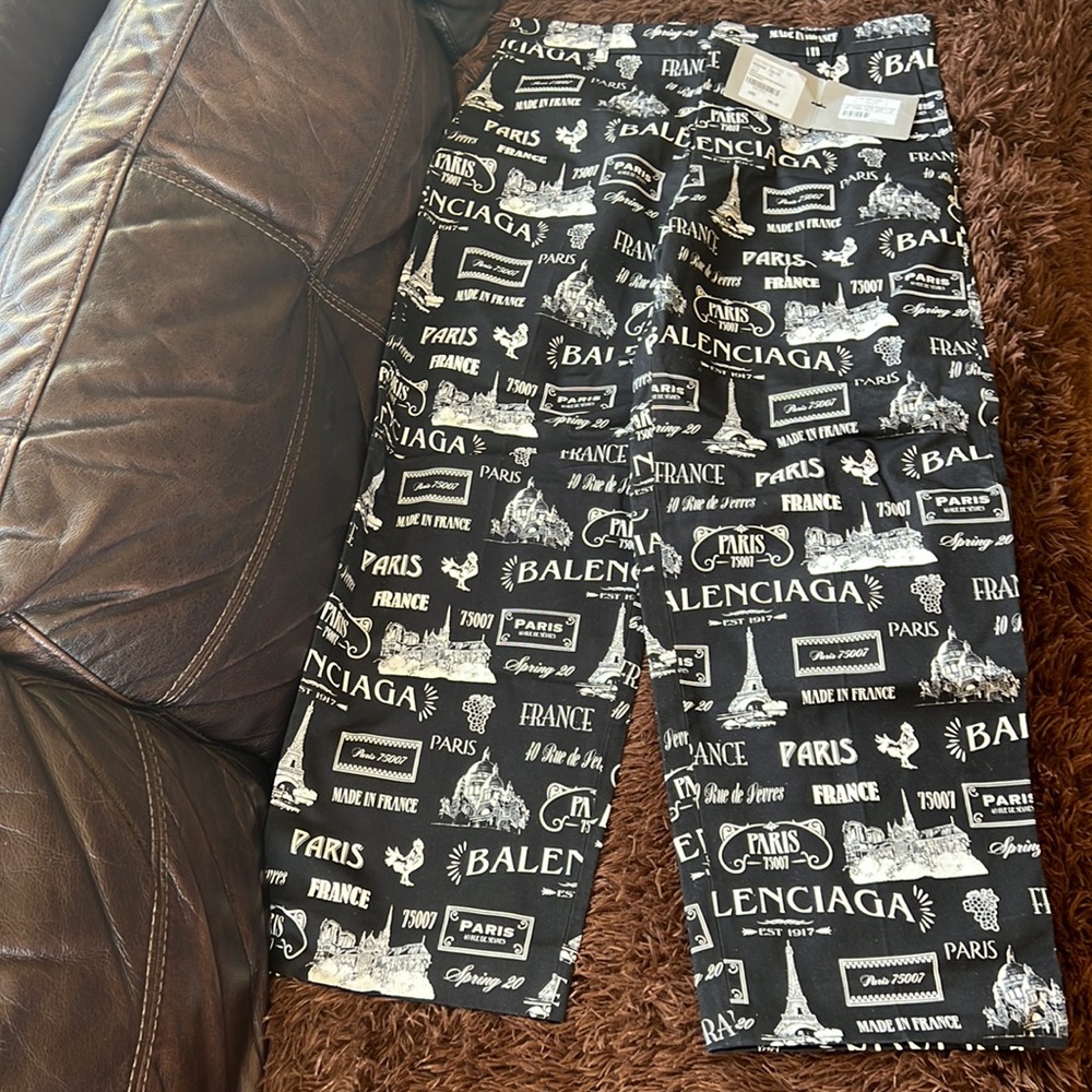 BALENCIAGA
Men's Black Printed Trousers, Brand Size 48